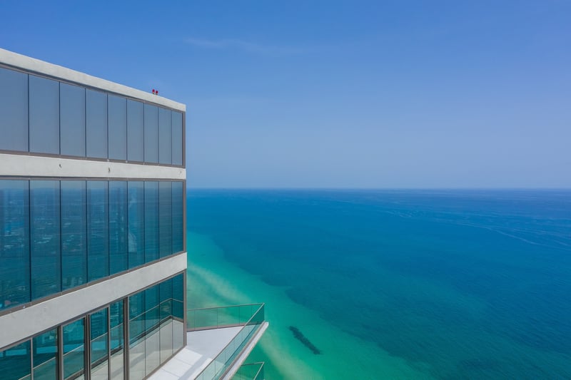 Ocean-facing glass terrace at Residences by Armani/Casa in Sunny Isles Beach