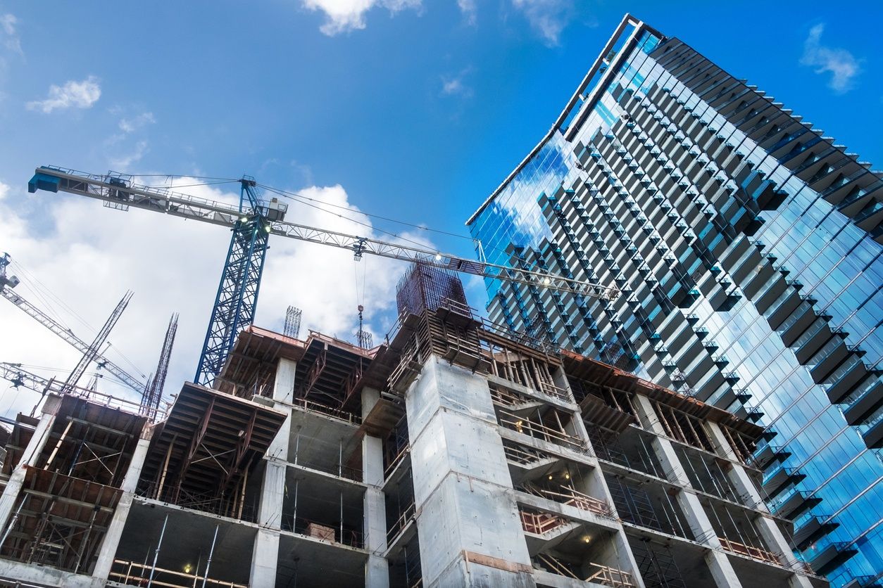 image of a pre-construcion condo in miami with blue sky in the background