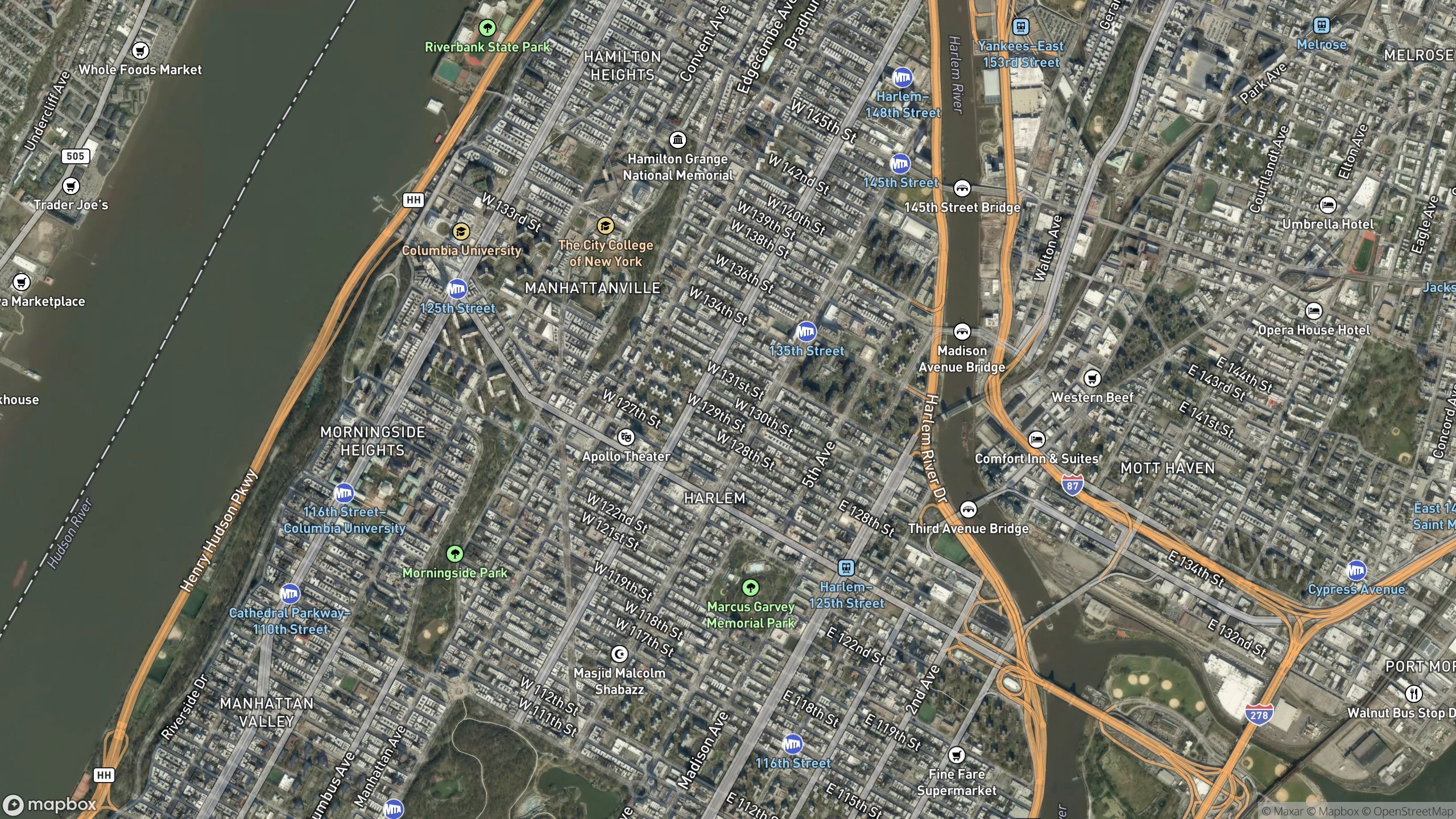 Aerial view of Harlem brownstone blocks and Upper Manhattan