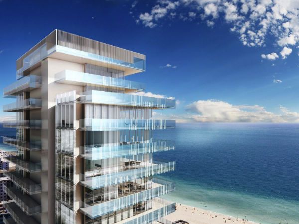 Glass Miami Beach tower overlooking the Atlantic Ocean