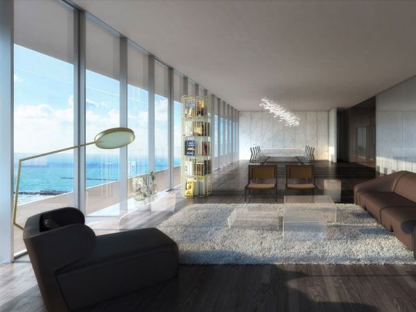 Glass Miami Beach residence interior with floor-to-ceiling ocean views