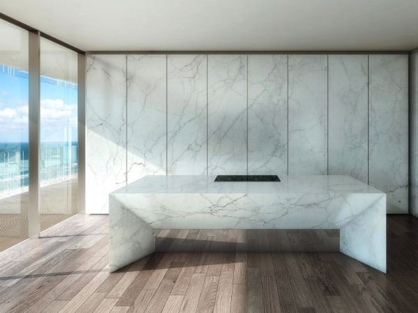 Stone kitchen inside a Glass Miami Beach residence